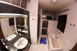Ett badrum på Palmera Hotel CDE