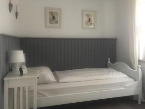 Ein Bett oder Betten in einem Zimmer der Unterkunft Landhotel Baumanns Hof