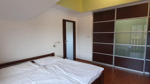 Posteľ alebo postele v izbe v ubytovaní Apartmány EDDY