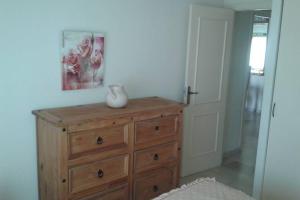 Łóżko lub łóżka w pokoju w obiekcie Apartamento Bellasol