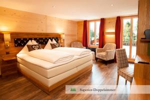 Voodi või voodid majutusasutuse Hotel Waldrand toas