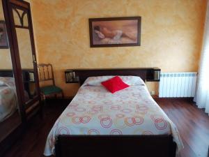Cama o camas de una habitación en Hospedaje Menendez Pelayo