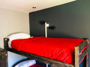 Postel nebo postele na pokoji v ubytování Hostel Olimpo House