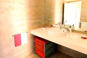 a bathroom with a sink and a mirror at Mallorca Villa Bon Aire Son Bernat in Llubí +30 photos