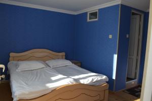 Postel nebo postele na pokoji v ubytování Guesthouse Qarim