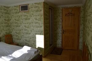 Postel nebo postele na pokoji v ubytování Guesthouse Qarim