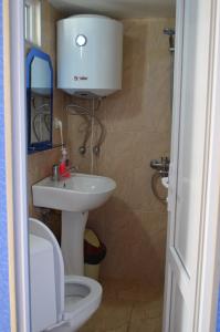 Koupelna v ubytování Guesthouse Qarim