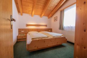 
Ein Bett oder Betten in einem Zimmer der Unterkunft Ferienheim Gabi
