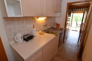 Kuchyň nebo kuchyňský kout v ubytování APARTMAN STRANIĆ + 2 fotografie