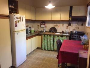 Kuchyň nebo kuchyňský kout v ubytování Hostel Casa & Campo