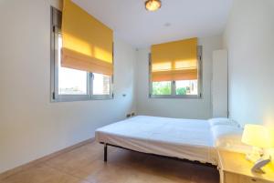 Postel nebo postele na pokoji v ubytování Club Villamar - Veruma + 29 fotografií