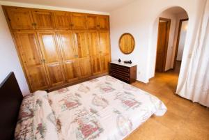 A bed or beds in a room at Club Villamar - Sport