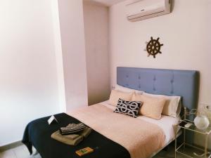 Posteľ alebo postele v izbe v ubytovaní Hostal Casa Nautilus