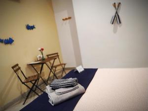 Posteľ alebo postele v izbe v ubytovaní Hostal Casa Nautilus