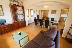A television and/or entertainment centre at Club Villamar - Sport