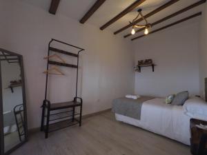 Posteľ alebo postele v izbe v ubytovaní Apartamentos Fuente Nueva II