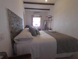 Posteľ alebo postele v izbe v ubytovaní Apartamentos Fuente Nueva II