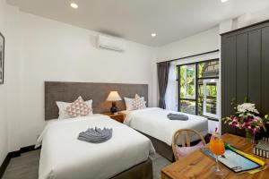 Postel nebo postele na pokoji v ubytování Patong Garden House - Luxury Villa in Patong Hills + 27 fotografií