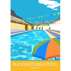 a poster of a swimming pool with an umbrella at Bossell Cottage Devon in Buckfastleigh