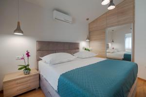 Ein Bett oder Betten in einem Zimmer der Unterkunft Villa Biston