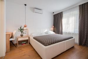 Ein Bett oder Betten in einem Zimmer der Unterkunft Villa Biston