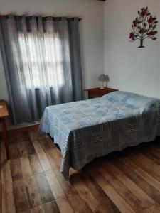 Postel nebo postele na pokoji v ubytování Casa Rústica