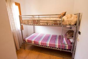 A bed or beds in a room at Club Villamar - Sport