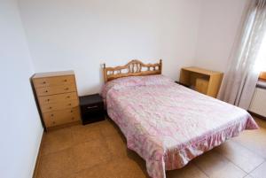 A bed or beds in a room at Club Villamar - Sport