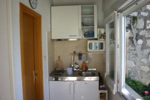 Kuchyň nebo kuchyňský kout v ubytování Apartments Dubrovnik Center