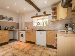 Köök või kööginurk majutusasutuses Springarth Cottage