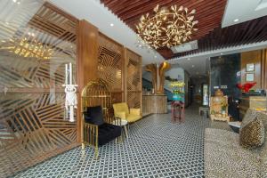 Predel za sedenje v nastanitvi Hoang Trinh Hotel
