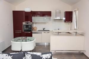Kuchyň nebo kuchyňský kout v ubytování Apartment Markorcula