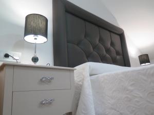 Postel nebo postele na pokoji v ubytování Hotel Restaurante Boabdil
