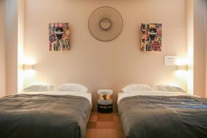 Ένα ή περισσότερα κρεβάτια σε δωμάτιο στο d3 HOTEL gallery3