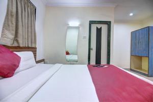Postel nebo postele na pokoji v ubytování Hotel Sunshine Airport