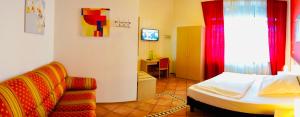Postel nebo postele na pokoji v ubytování Hotel Aurelia + 35 fotografií