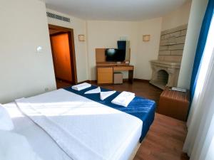 Postel nebo postele na pokoji v ubytování Afytos Bodrum City