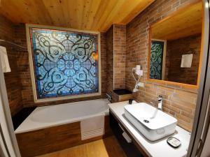 Vonios kambarys apgyvendinimo įstaigoje Green Resort