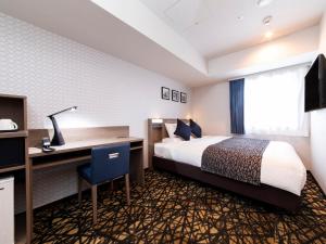 Postel nebo postele na pokoji v ubytování HOTEL MYSTAYS Aomori Station + 37 fotografií