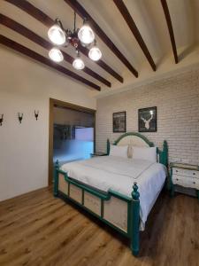 Lova arba lovos apgyvendinimo įstaigoje Green Resort