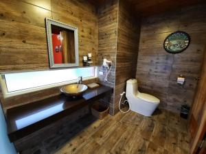 Vonios kambarys apgyvendinimo įstaigoje Green Resort