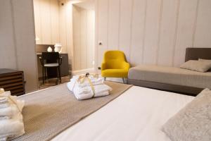 Posteľ alebo postele v izbe v ubytovaní B&B Palazzo Perrotta
