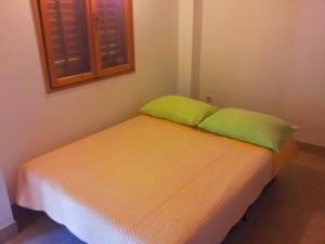 Postel nebo postele na pokoji v ubytování Getaway Beach House