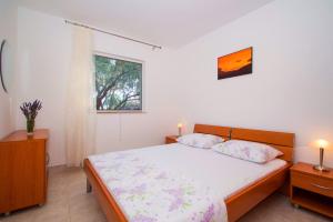 Postel nebo postele na pokoji v ubytování Getaway Beach House