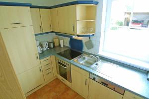 Küche/Küchenzeile in der Unterkunft Ferienhaus An der alten Waldschänke WS-11a