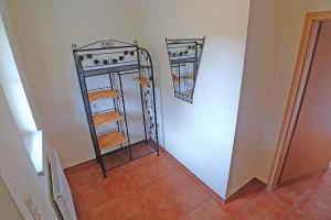 Ein Bett oder Betten in einem Zimmer der Unterkunft Ferienhaus An der alten Waldschänke WS-11a