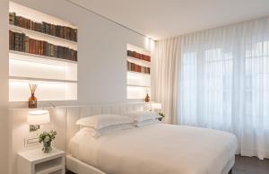 Magna Pars l'Hotel à Parfum, Small Luxury Hotels of the World客房内的一张或多张床位