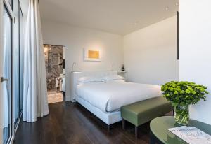 Magna Pars l'Hotel à Parfum, Small Luxury Hotels of the World客房内的一张或多张床位