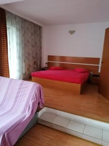 Cama ou camas em um quarto em Villa Edera Residence - Gazda Profesionista