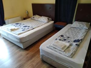 Postel nebo postele na pokoji v ubytování Fenix Family Hotel